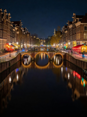 Amsterdam historic canals reflecting illuminated bridges and urban nightlife lights